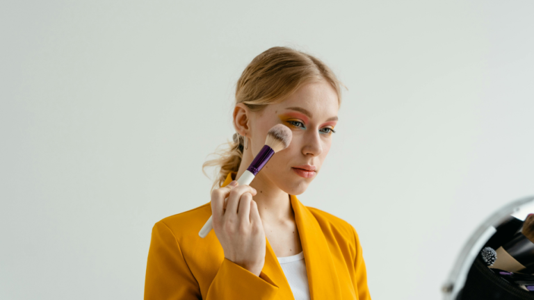 A beautiful young woman doing make-up